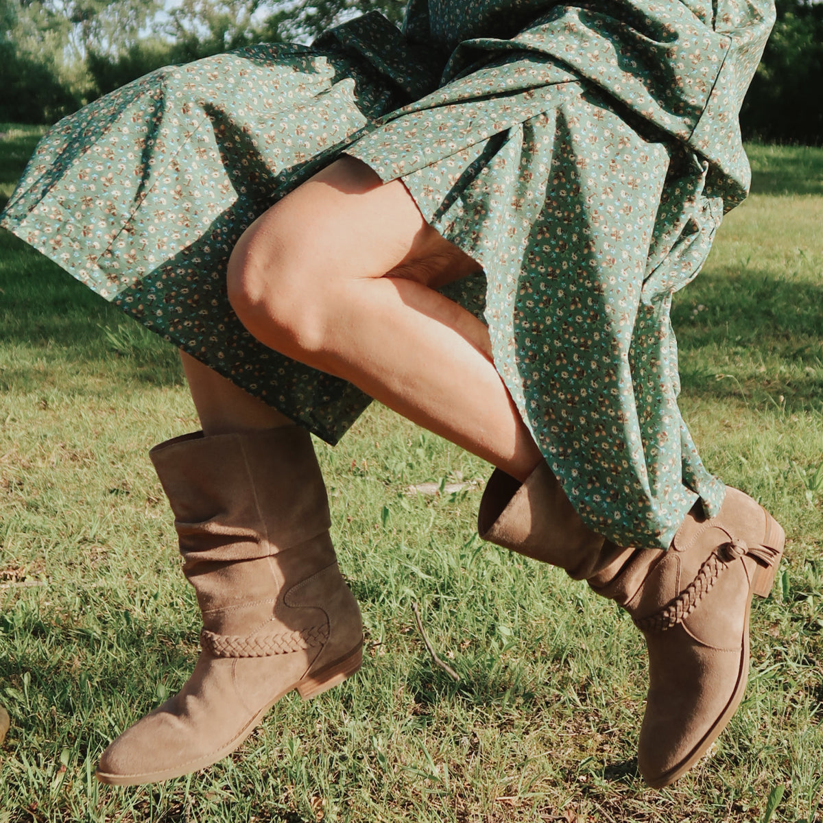 Promotional banner featuring braided detail boots